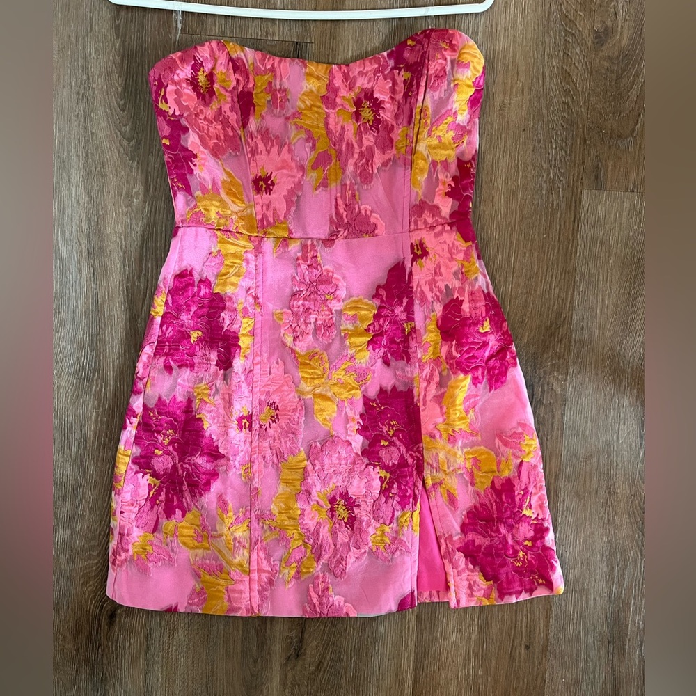 Never been worn pink strapless dress. NWT, just got the wrong size.